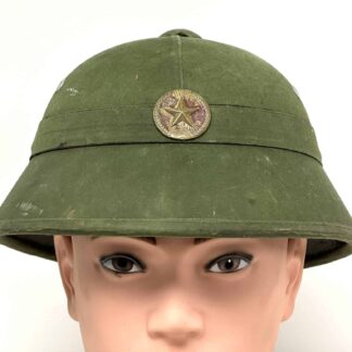 North Vietnamese Army 3rd Generation Sun Helmet with Shrapnel Stuck Inside, Brass Badge, Date and Name